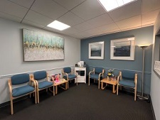 waiting area with blue chairs