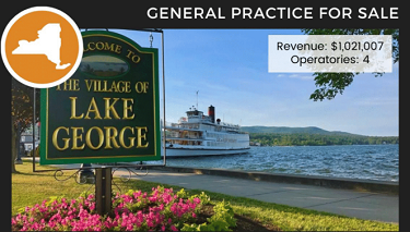 Lake George sign with lake and boat in background