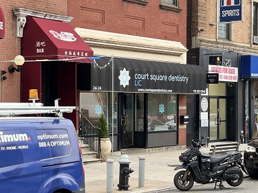 Row of brick buildings on city street