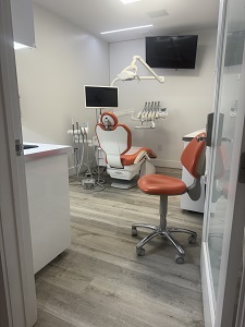 Dental operatory with orange chair