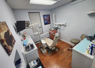 dental operatory with chair and cabinets
